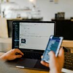 Smartphone displaying new email notifications and marketing messages